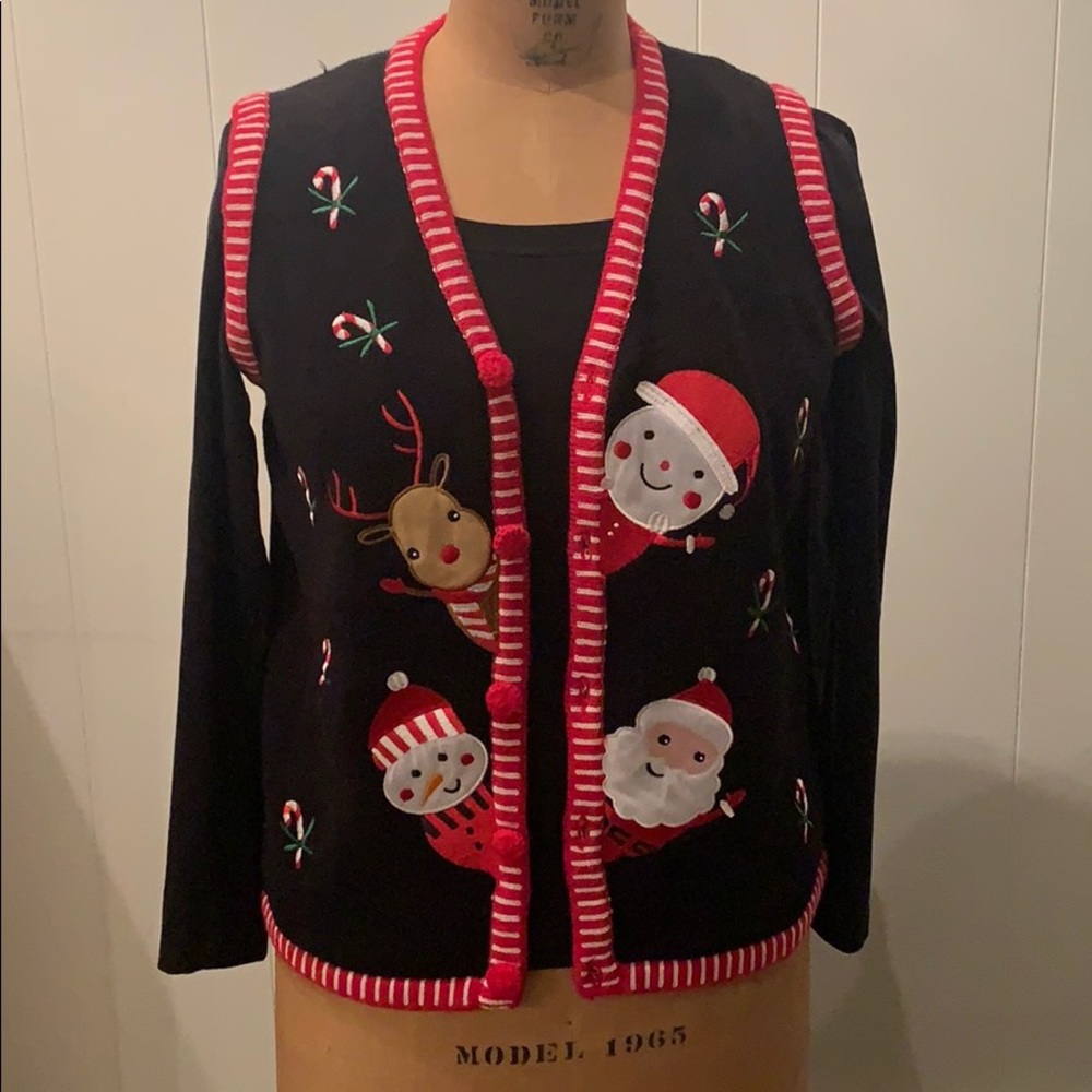 Christmas vest and black long sleeve.